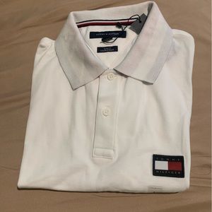 Tommy Hilfiger polo. White, red and black in the collar.